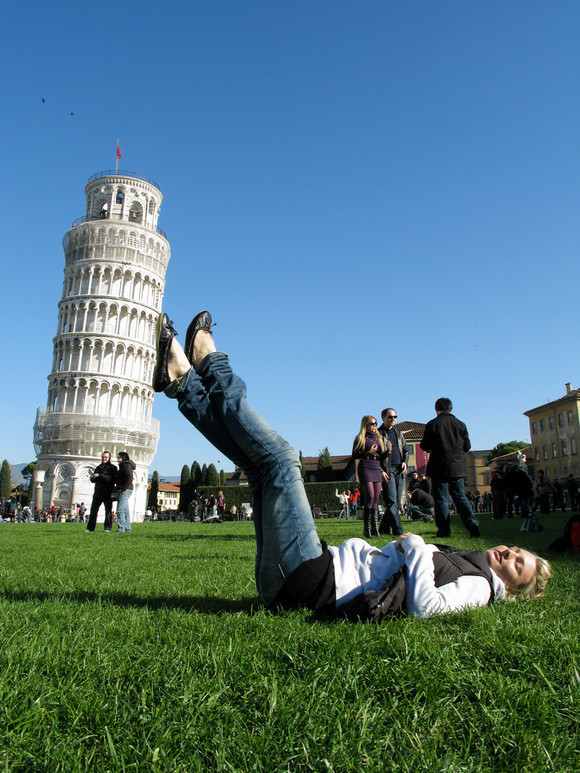 Suzi holding the Leaning Tower of Pisa